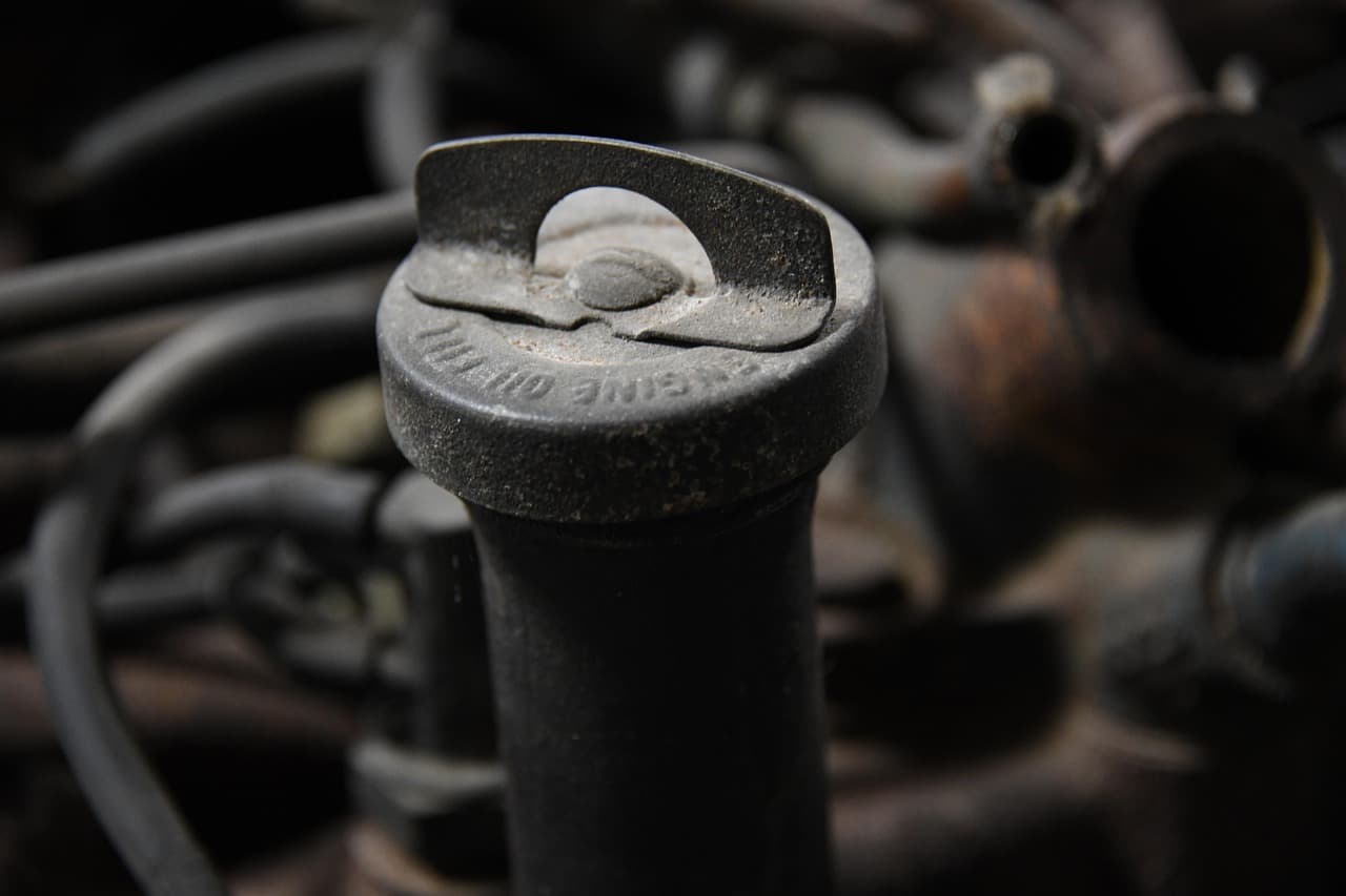 The oil filler cap on a car engine